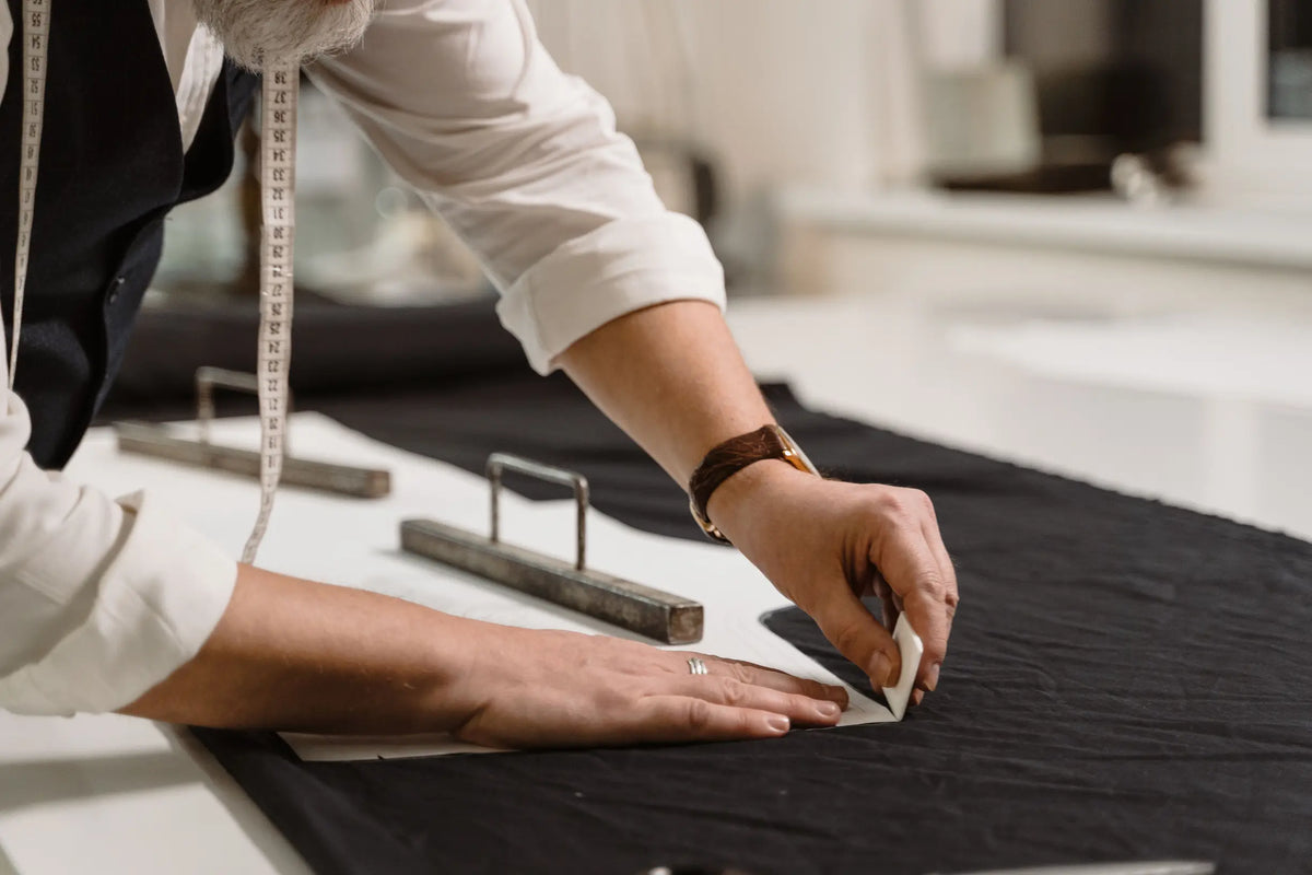 Which five fabrics and stitches indicate a garment is built for repair and longevity?