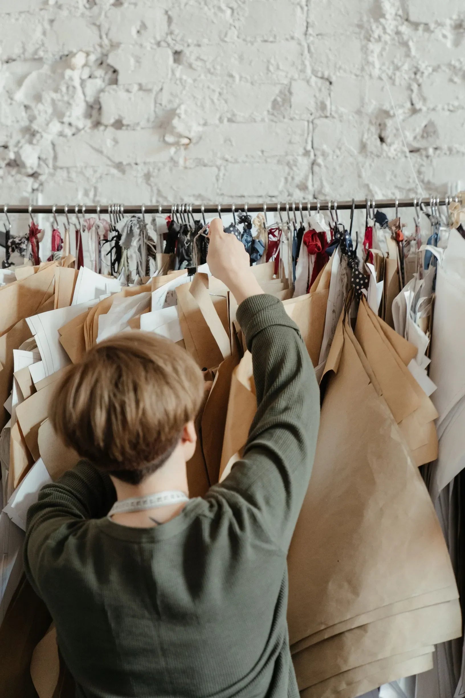 Which five removable features best retain a garment's fit after repair?